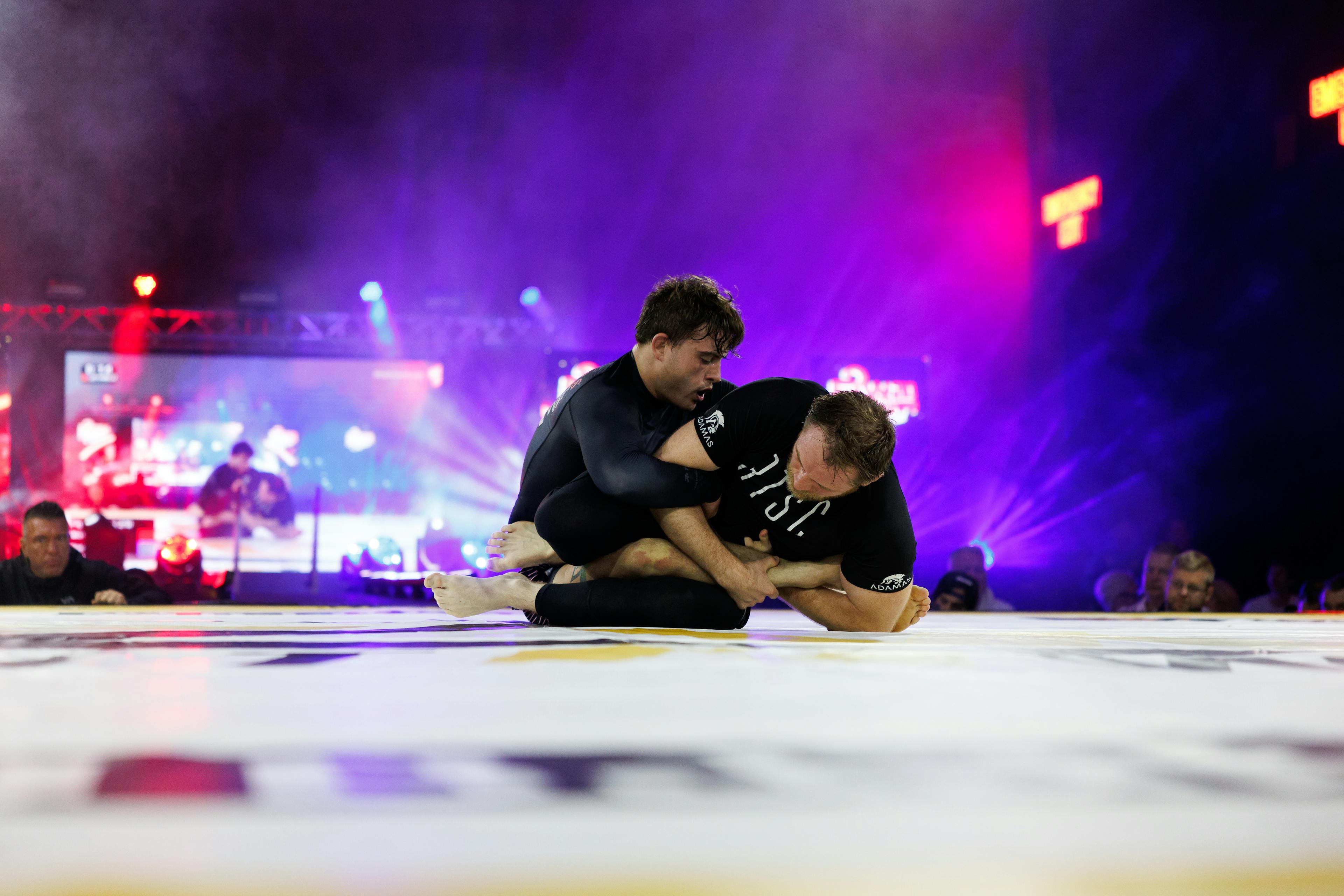 A competitor performing a leg lock on another competitor