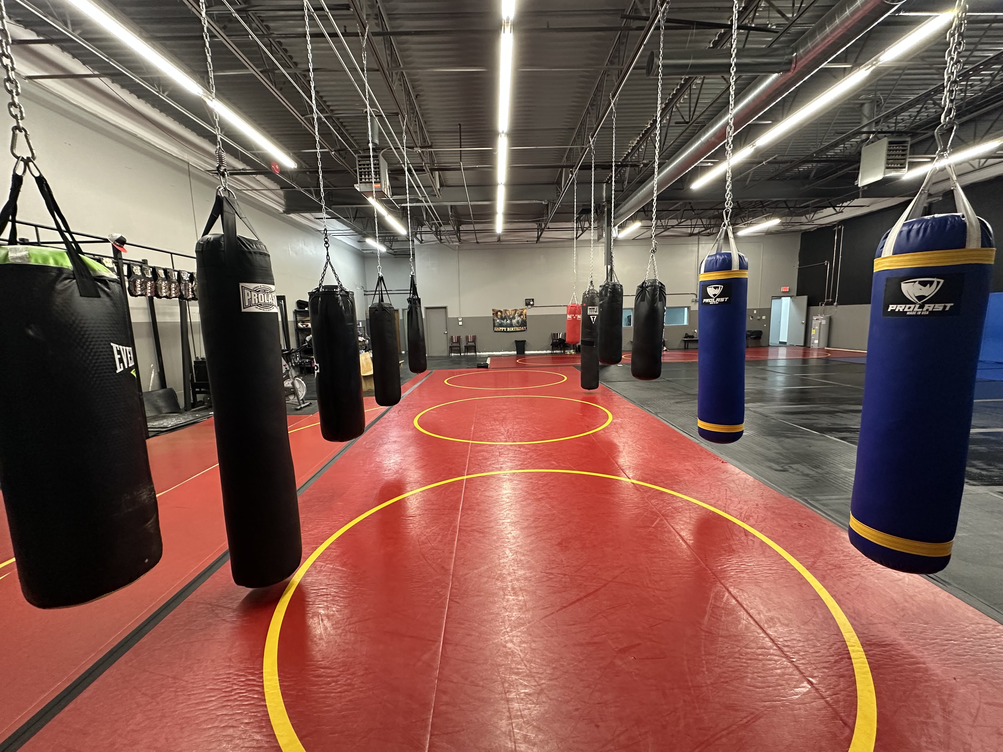 Wide view of the boxing bags at Tackle Jiu Jitsu