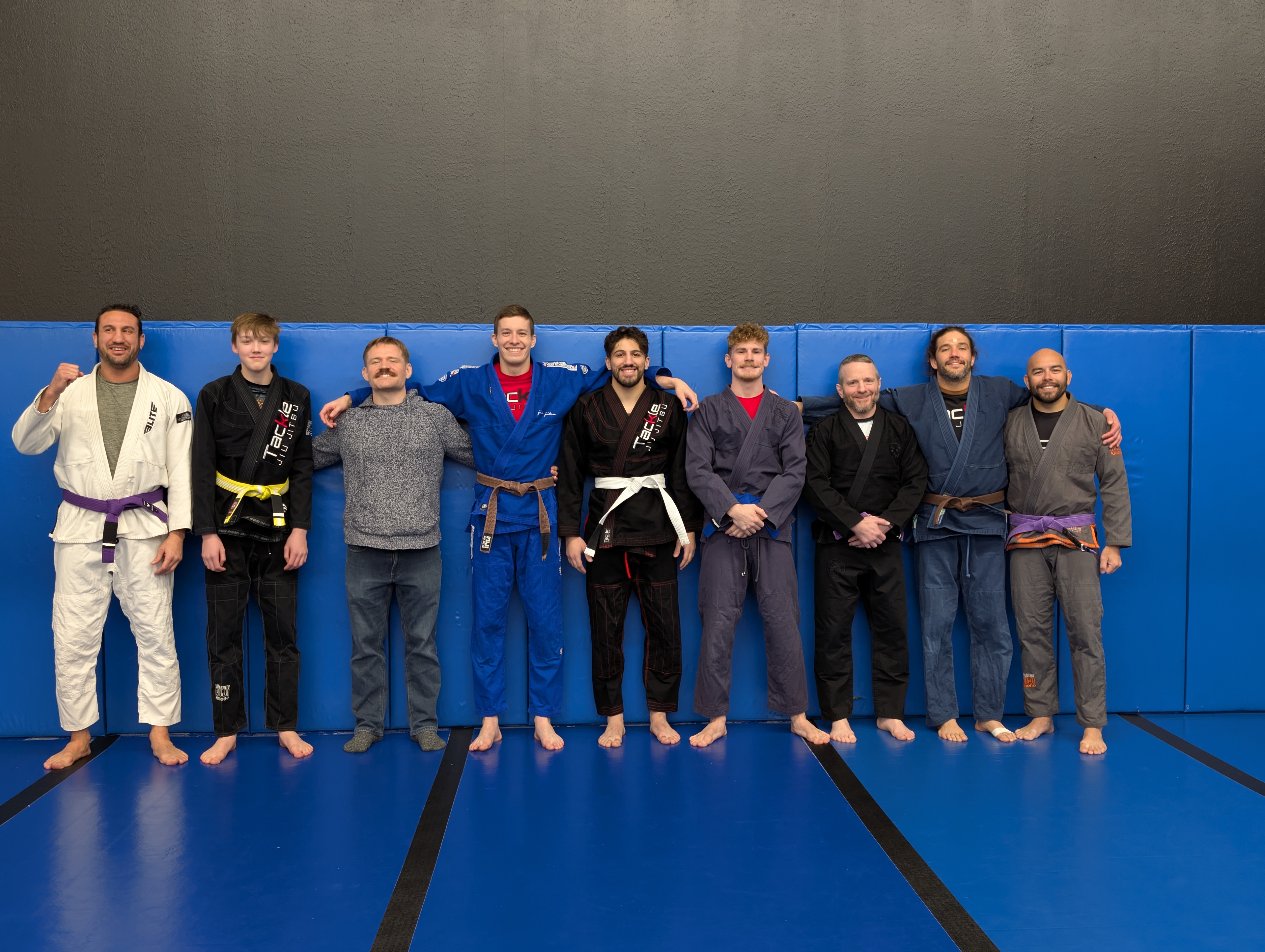 A picture of a class lined up at Tackle Jiu Jitsu
