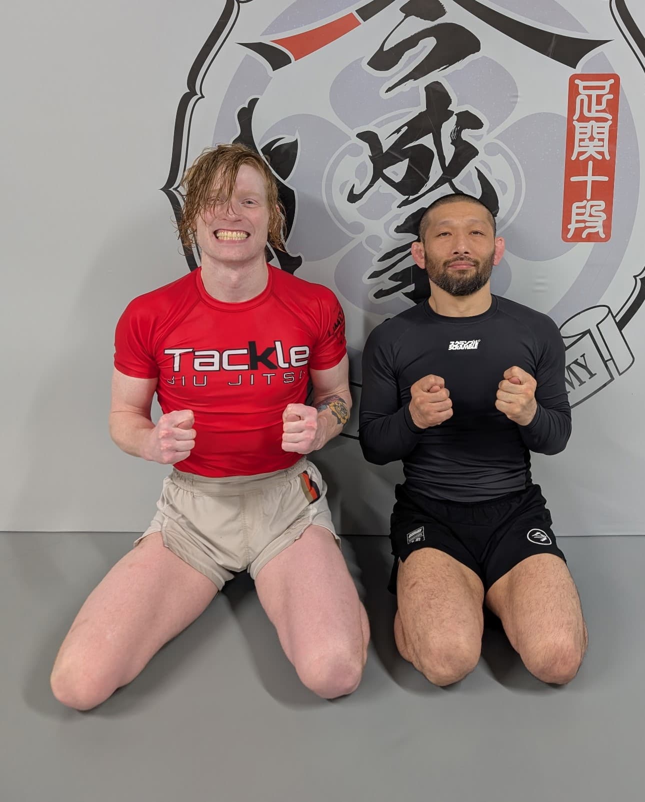 Wyatt Routson posing with Masakazu Imanari