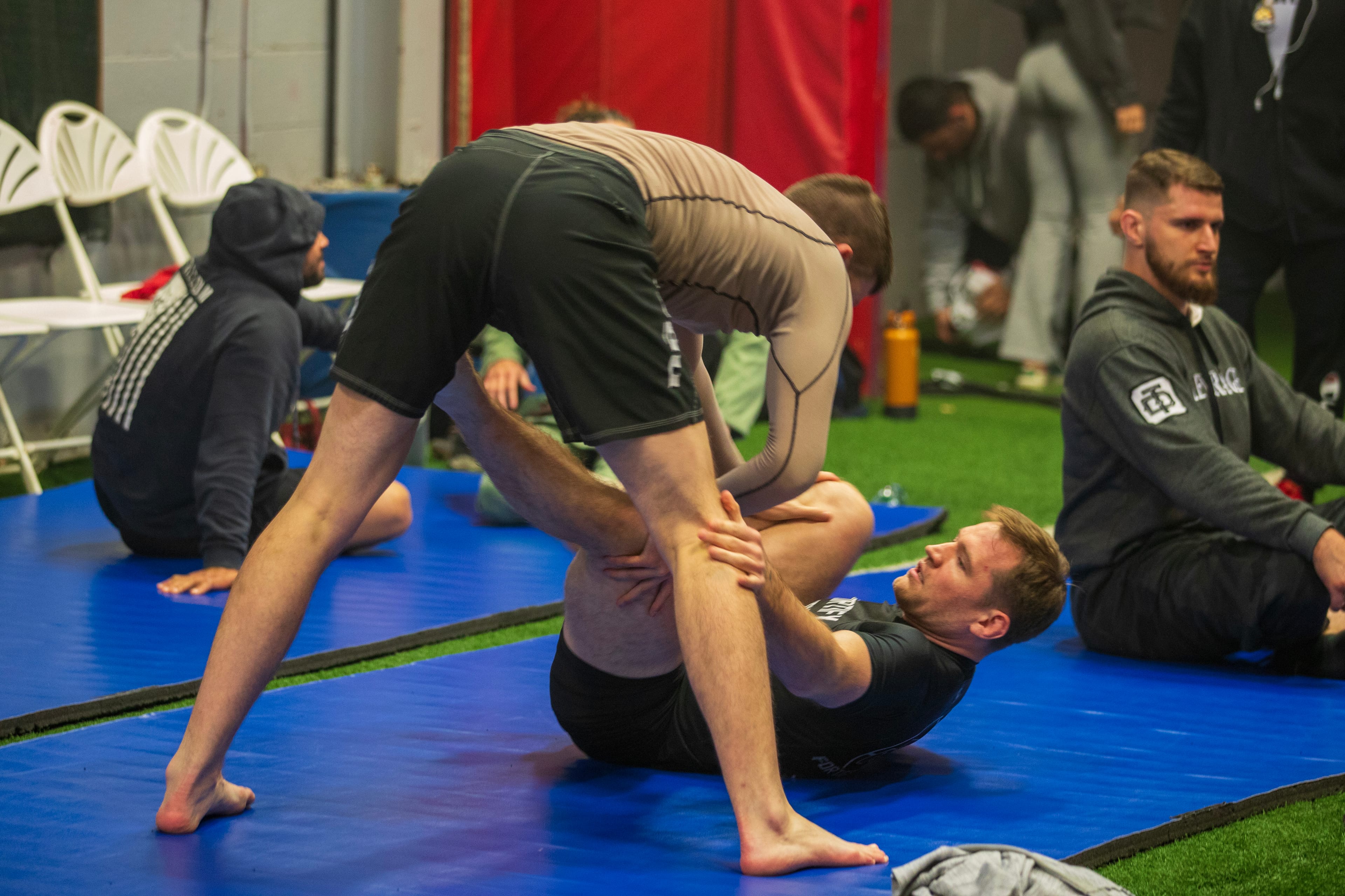 Two people warming up before a competition